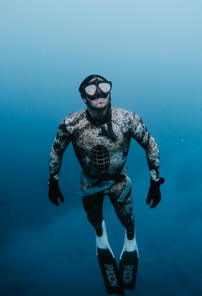 Man in Drysuit Underwater